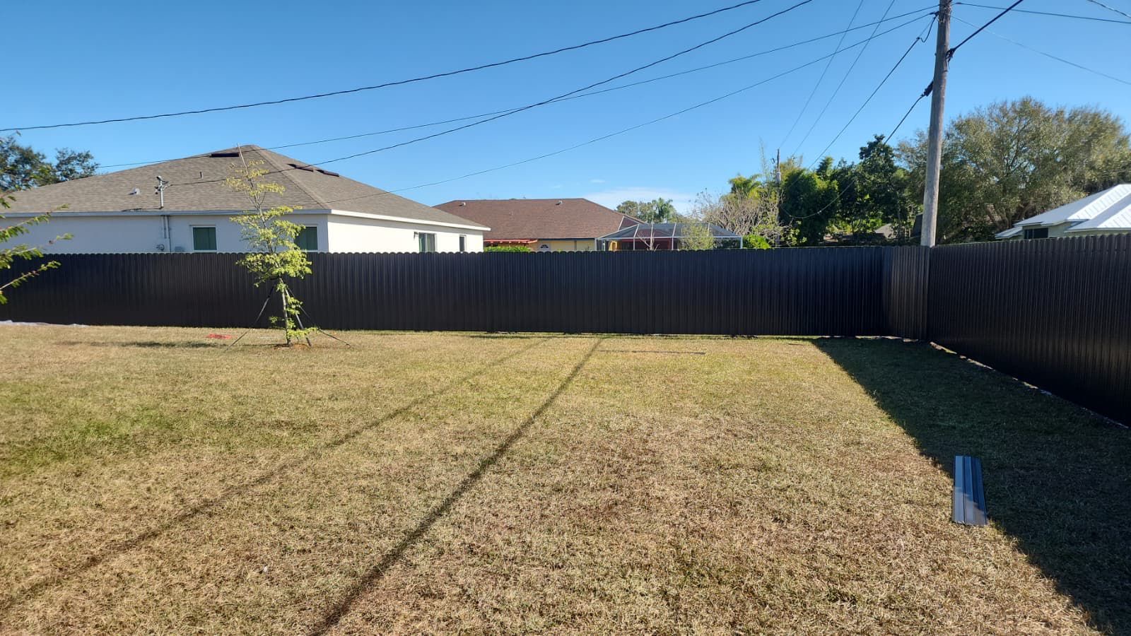 Completed backyard fence enclosure